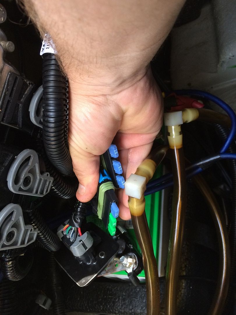 There are three fuse blocks. This is what is in mine for fuses. Thr green  ones are 30amp the blue ones are 15 and the grey/clear ones are 2