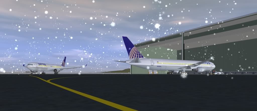 B767Unitedx2Snow.jpg